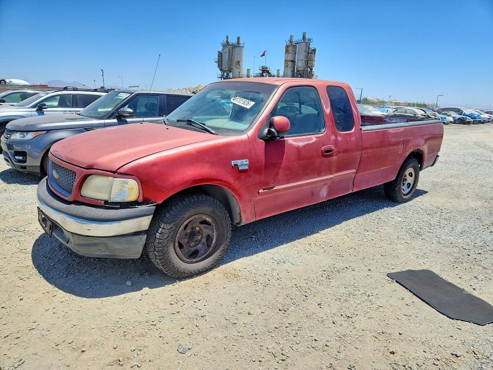 1999 Ford F150 — фото 1
